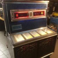 Jukebox d'epoca, funzionante completo di 45 giri