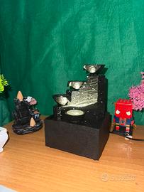 cascata illuminata acqua infinita