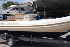 BSC 61 + Suzuki 150 + carrello