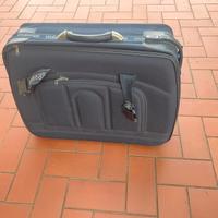 Valigia da viaggio semi-rigida - spallacci rotelle