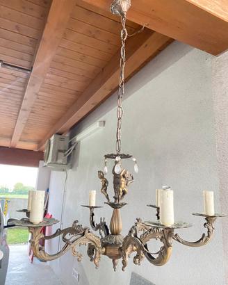 Lampadario anno 1960 in metallo con putti