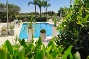 Camere in villa con piscina