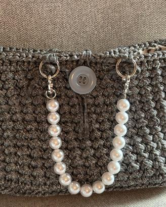 Borsa argento con manico in perle