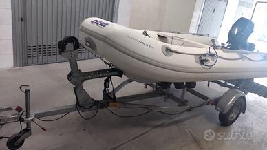 Gommone, motore e carrello stradale