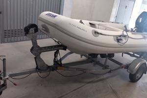 Gommone, motore e carrello stradale