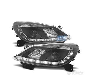FARI OPEL CORSA D 06-10 LUCE DIURNA FONDO NERO