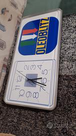 Insegna orologio Oleoblitz poss sped