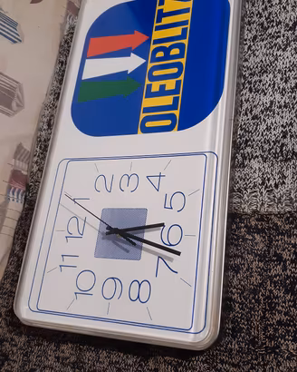 Insegna orologio Oleoblitz poss sped