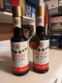 2 bottiglie Cherry Buton 0,75 vintage mai aperte.