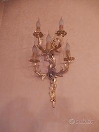 Applique in metallo dorato