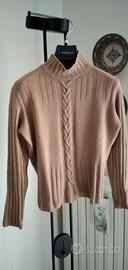 Maglione con treccia.