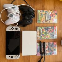 Nintendo Switch + Dock + 2 controller + 3 giochi