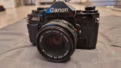 F otocamera Canon A1 con 50mm Canon f/1.8 e winder
