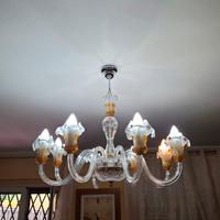 Lampadari e applique in cristallo.