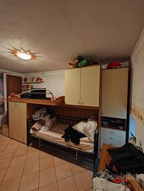 letto a castello con tantissimi spazi interni
