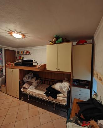 letto a castello con tantissimi spazi interni