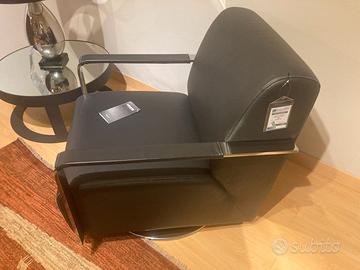 Poltrona girevole Alberta in pelle