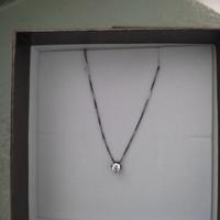 collanina in argento con punto luce ,nuova!!