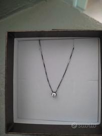 collanina in argento con punto luce ,nuova!!
