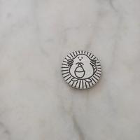 Moneta Pokemon in cartone raffigurante Chansey. 