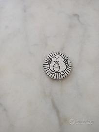 Moneta Pokemon in cartone raffigurante Chansey. 