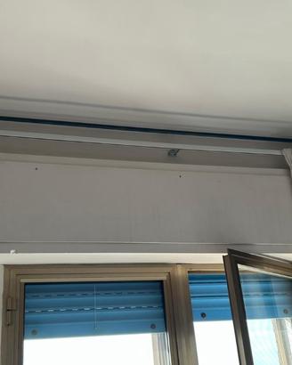 Bastone per tenda in ferro battuto con supporti