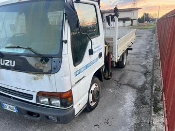ISUZU CON GRU CASSONE FISSO