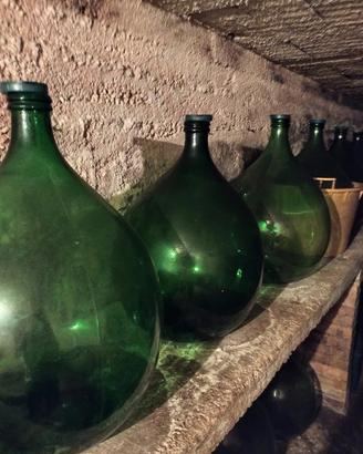 18 antiche  damigiane in vetro verde  per vino