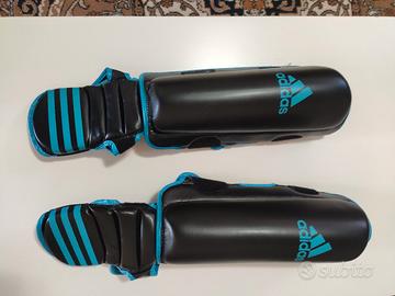 Parastinchi Adidas M - Nero/Celeste - NUOVI