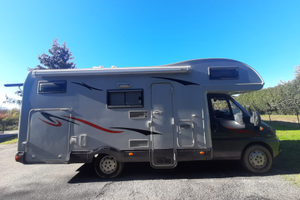 Camper mansardato roller team