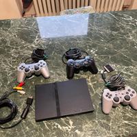PlayStation 2 con 3 controller e PES 2006