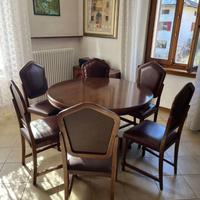 Tavolo rotondo in legno allungabile con 6 sedie