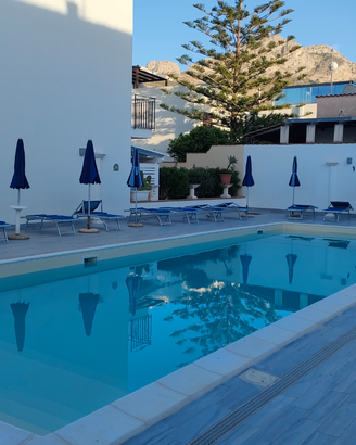 Appartamento con piscina e giardino