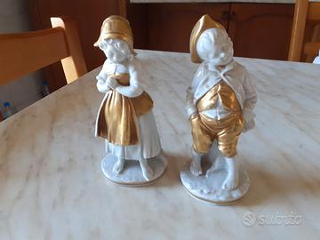 2 Statuine Capodimonte Bruno Merli finiture dorate