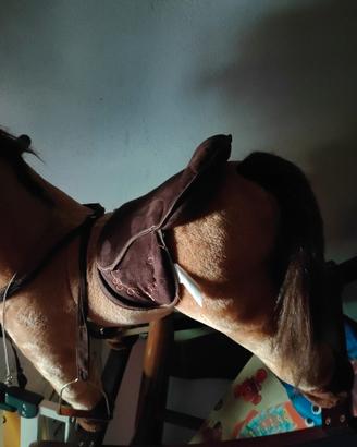cavallo a dondolo con musica