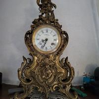 orologio e due candelabri