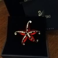 Swarovski spilla