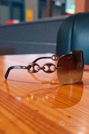 Occhiali da sole sfumati senza montatura Gucci 