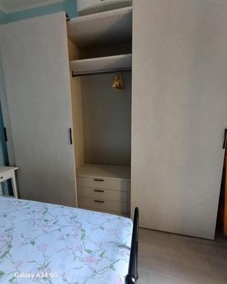 Armadio Skema in legno a tre ante scorrevoli color