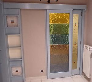 Porta scorrevole in vetro