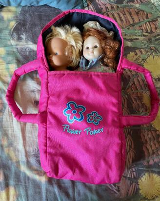 Porta bambole con due bambole.