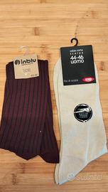 4 paia di calze lunghe di  OVS inblu coop