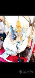 sdraietta con carillon e prodotti Baby