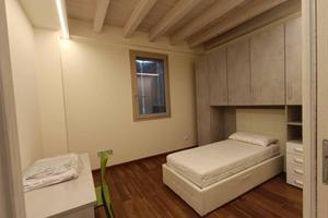 Appartamento di 14 m² con 2 locali e posto auto a 