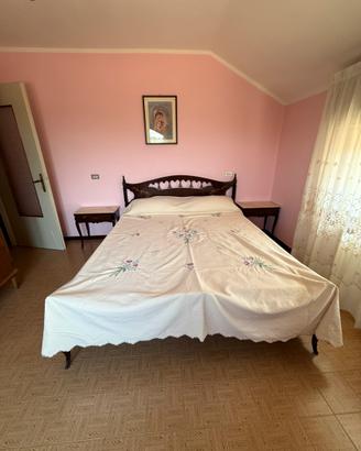 Una camera matrimoniale