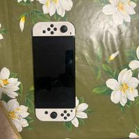Nintendo Switch oled con 4 giochi