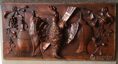 Coppia di pannelli scolpiti in legno