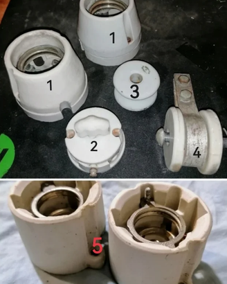 Vecchi accessori elettrici in porcellana