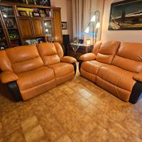Coppia divani in pelle con relax elettrico