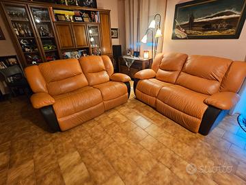 Coppia divani in pelle con relax elettrico